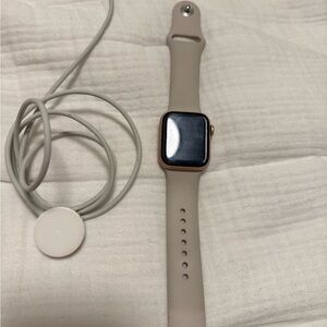 Apple Watch with charger and band